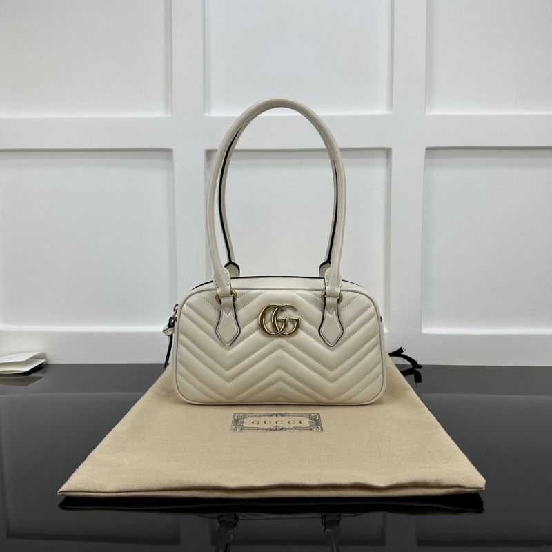 G*u*i top handle bags